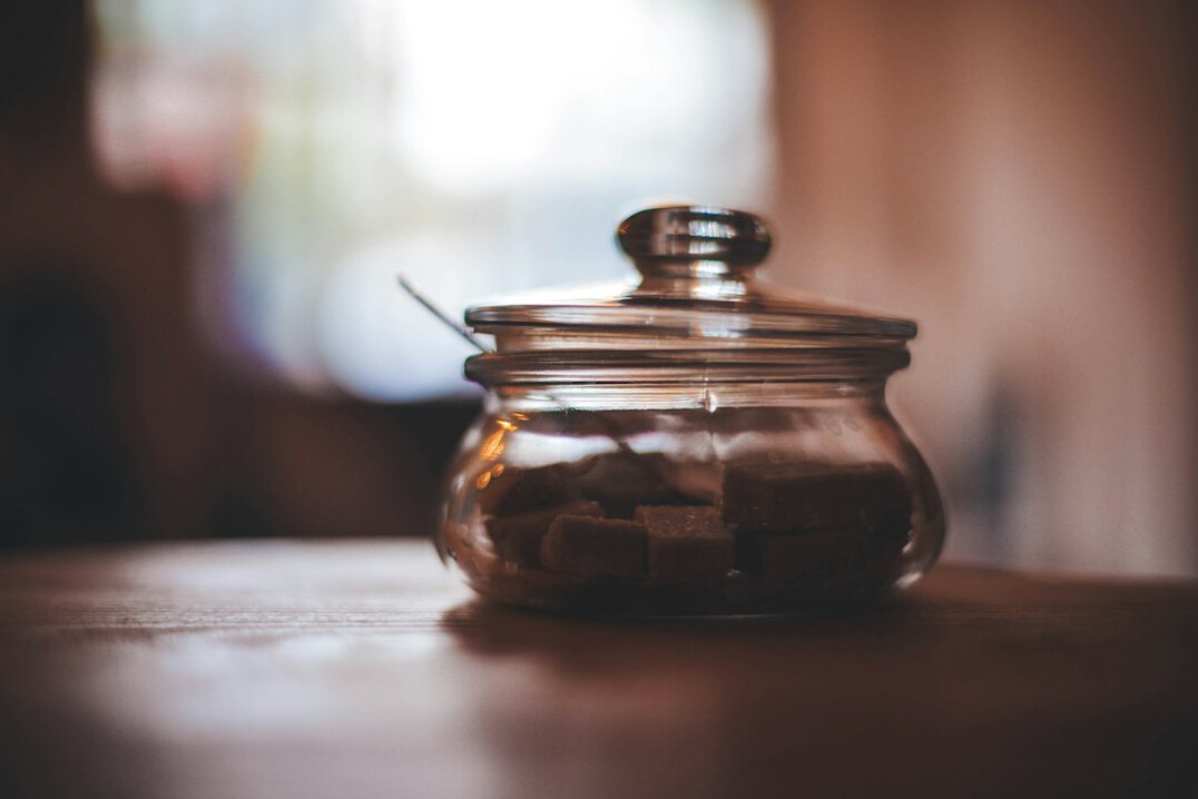 savings jar with coins