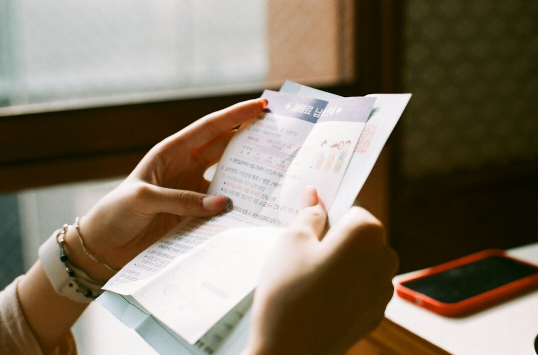 person reviewing budget papers